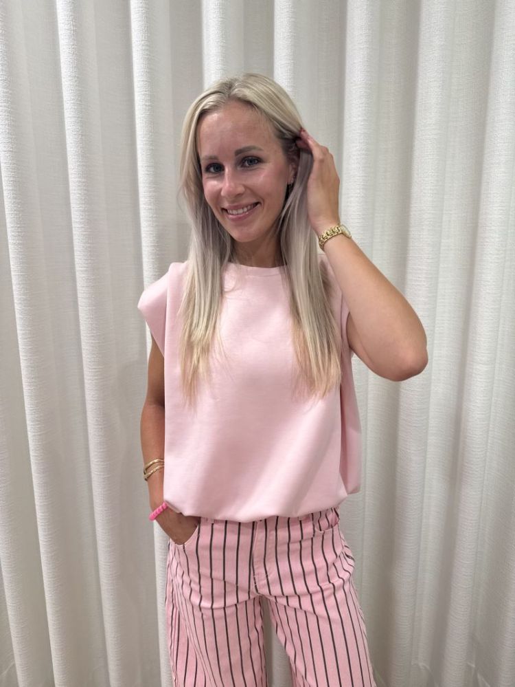Mouwloze top schouderdetail roos