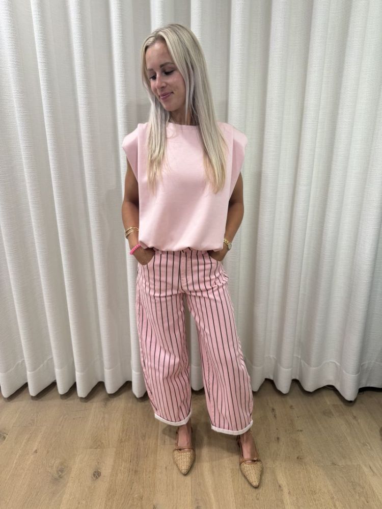 Mouwloze top schouderdetail roos